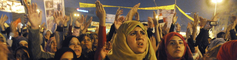 Cairo: Young female protestors, among thousands gathered in Tahrir Square. Photographer: Teun Voeten